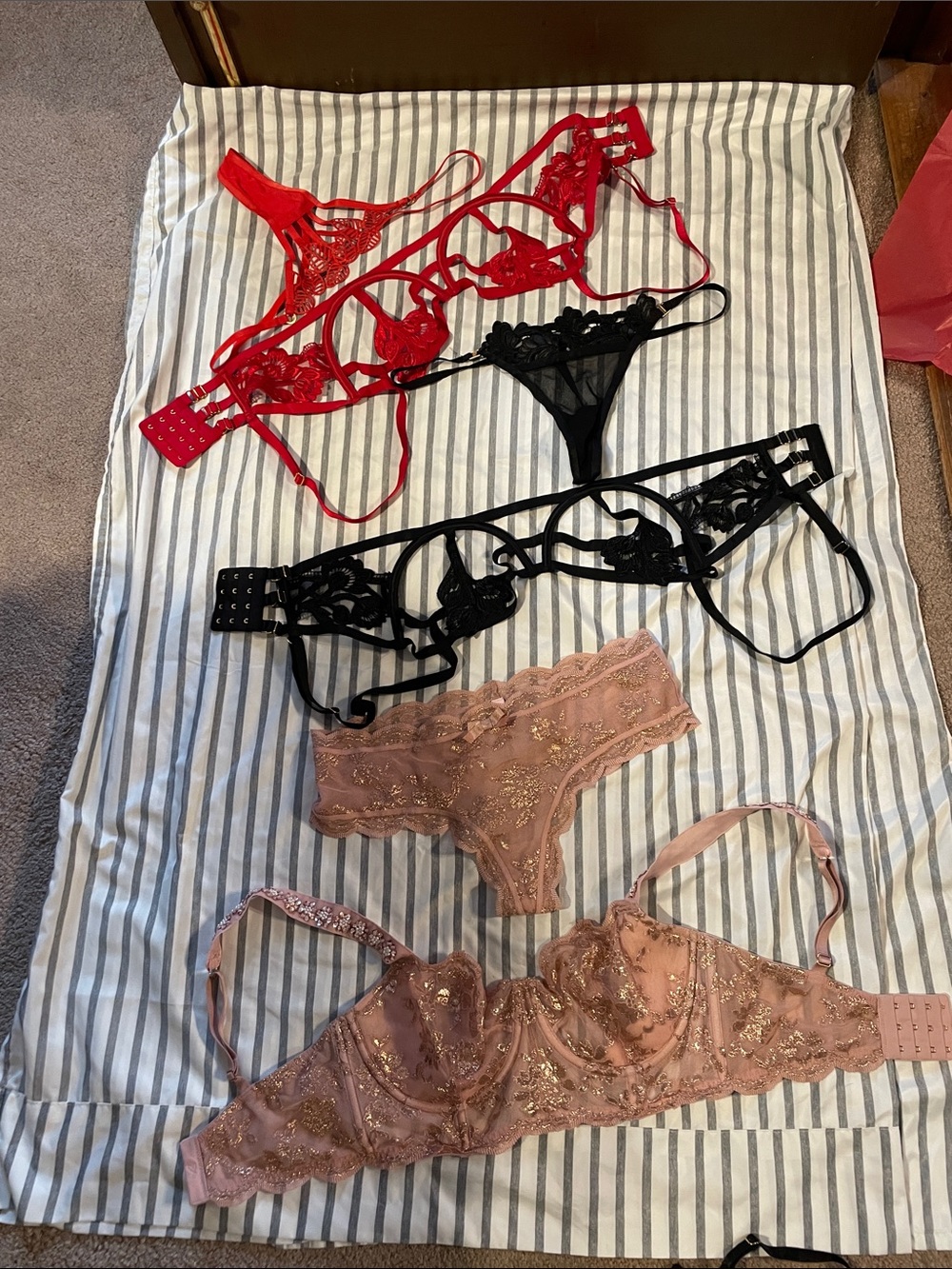 Three sets of Lacey, Strappy Lingerie Set, Red, Black and Blush